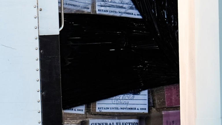 Georgia 2020 ballots are loaded by the FBI onto trucks on Wednesday, January 28, 2026. - Mike Stewart/AP