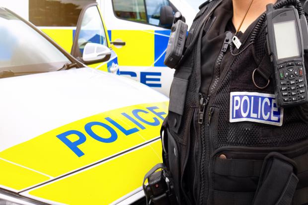 Woman in 40s seriously injured in junction crash between Mercedes and van