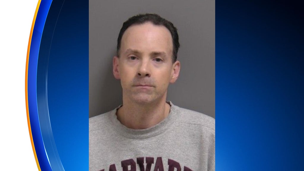 Fired Catholic school teacher charged with sexually abusing child while ...