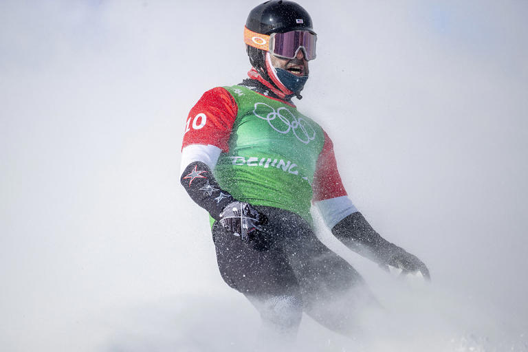 Nick Baumgartner during the men's snowboard cross finals at the 2022 Winter Olympic Games in Zhangjiakou, China. (Tim Clayton / Corbis via Getty Images file)
