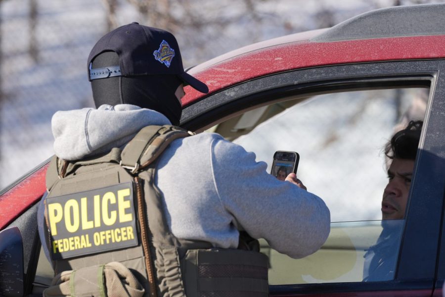 Masked agents, face scans and a question: Are you a citizen?