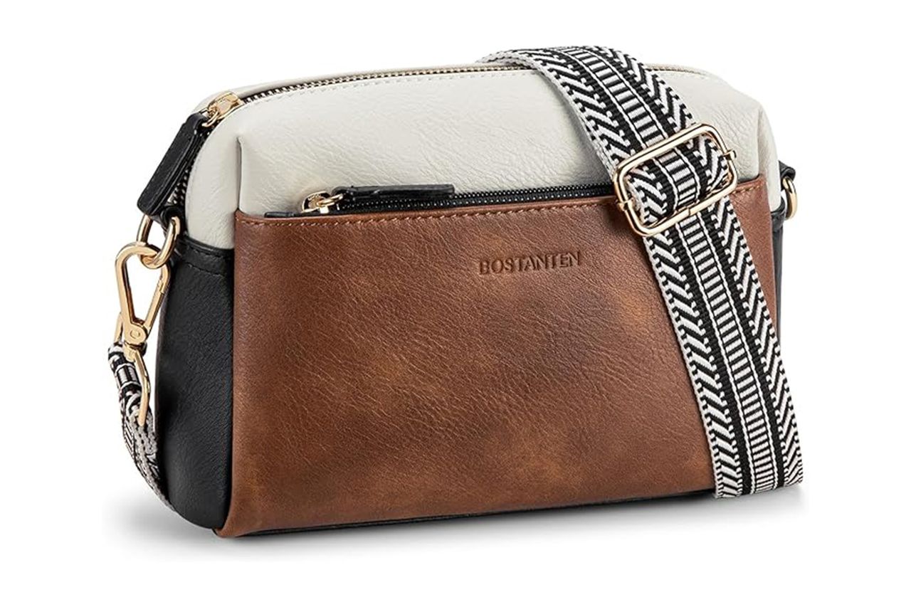Small crossbody purse with a twotone design and patterned strap