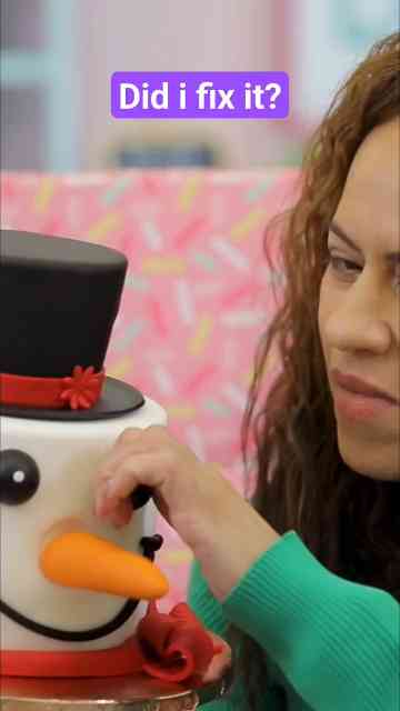 I accidentally fixed the eyes of this snowman cake after cutting it