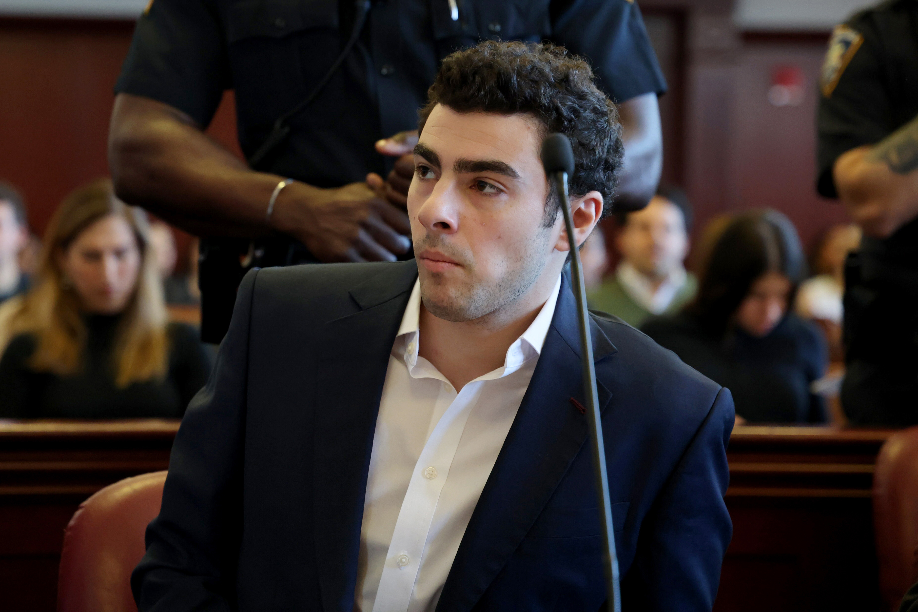 Judge takes death penalty off table in Luigi Mangione case; backpack ...