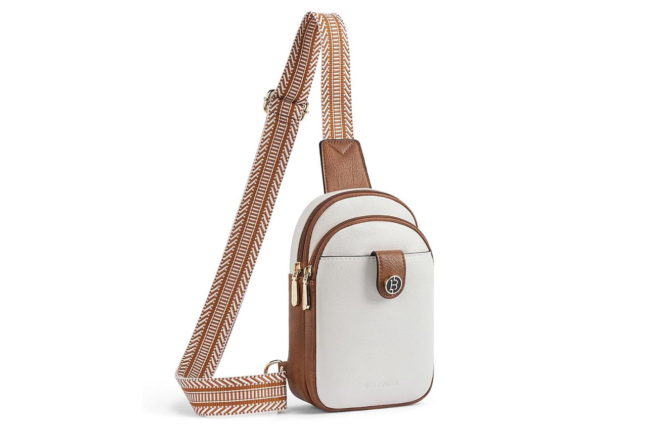 Small crossbody sling bag with a brown strap and compact design