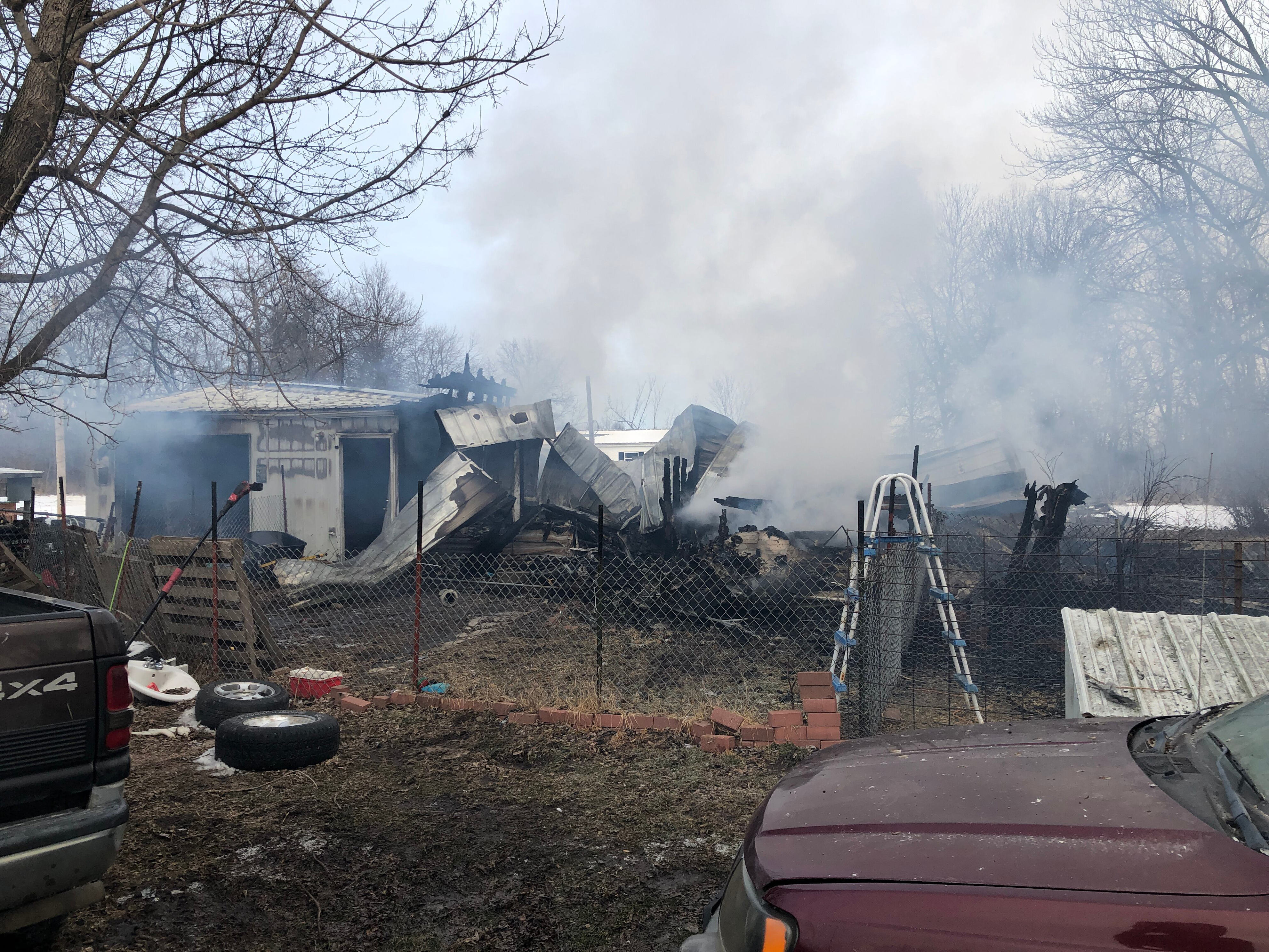 Local journalist and fire chief revive dog after early morning house fire
