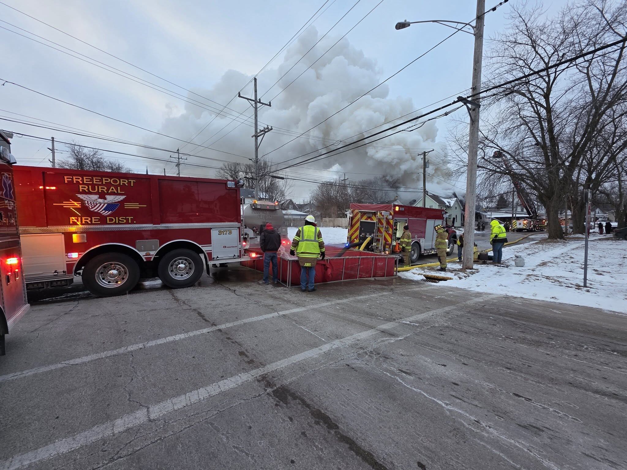 Crews battle fire on Clark Street in Freeport
