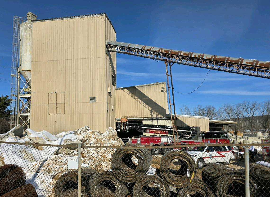 Crews called to rescue worker trapped in elevated sand hopper