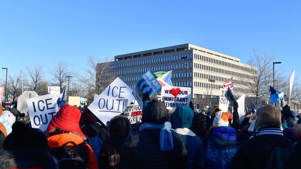 Faith leaders protest charges against ICE observers at Whipple building
