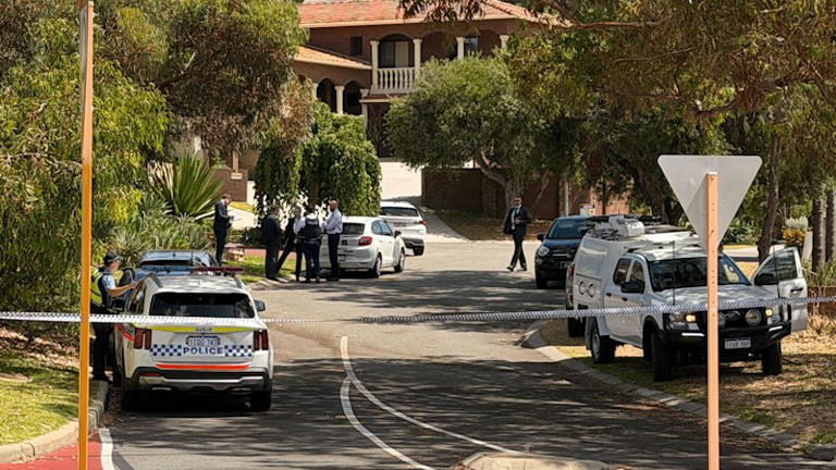 Police at the scene in Mosman Park on Friday morning.