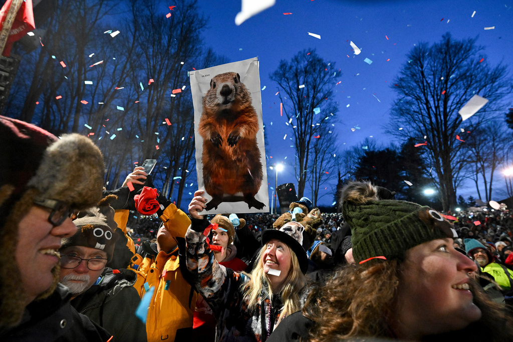 Punxsutawney Phil prepares to issue his Groundhog Day weather verdict from Gobbler