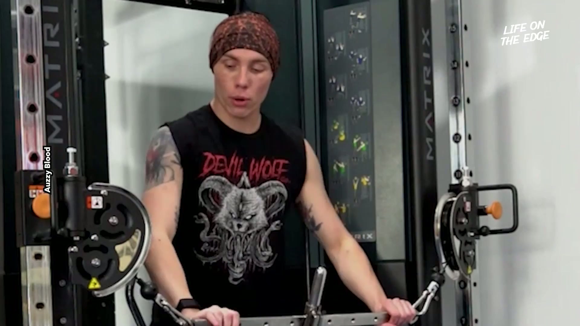 Weightlifting while sword swallowing