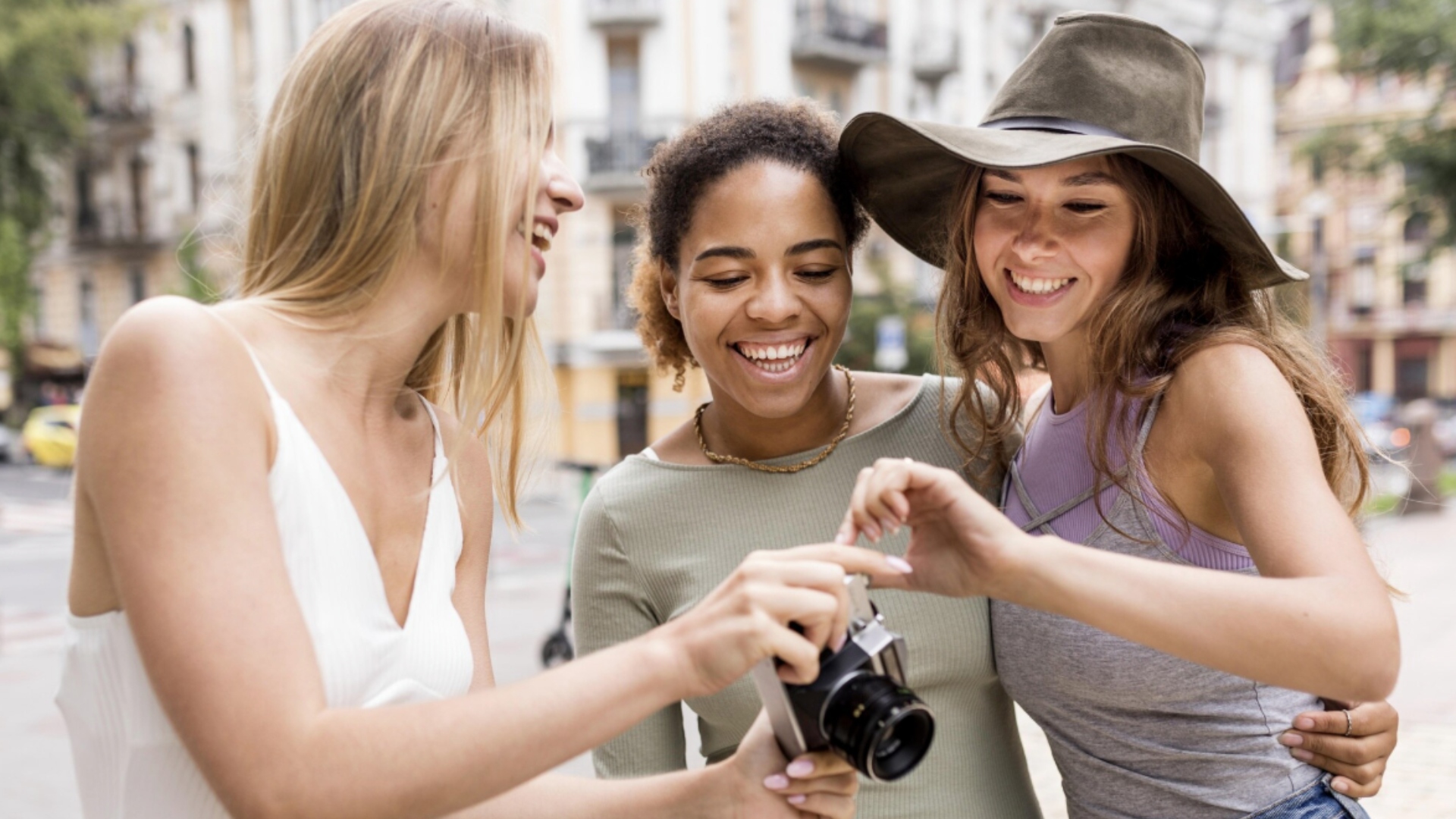 Why do some women still refuse group photos?