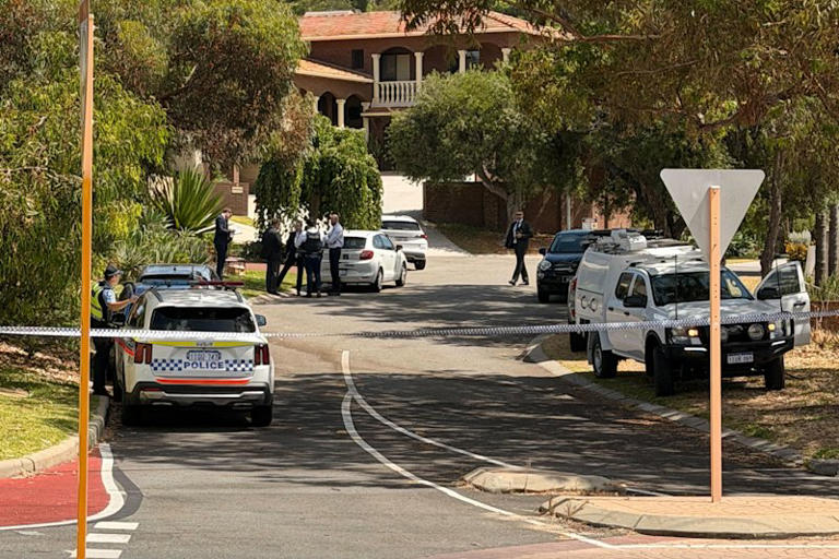 Police at the scene in Mosman Park on Friday morning.
