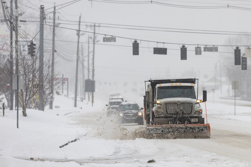 Blizzard-like 'bomb cyclone' brings heavy snow and freezing temps to ...