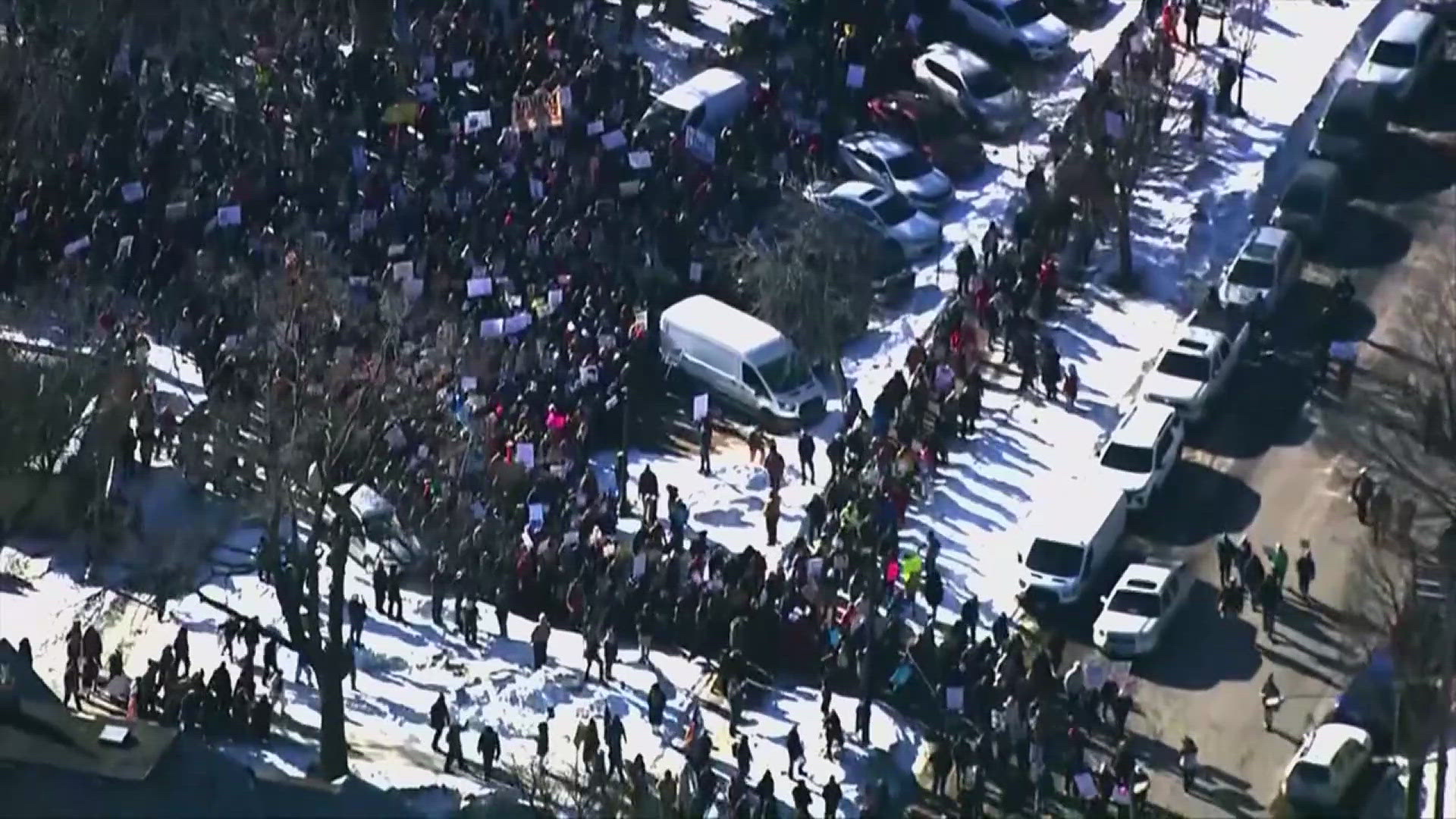 Demonstrators gather in Minneapolis to voice opposition to ICE raids and deportations