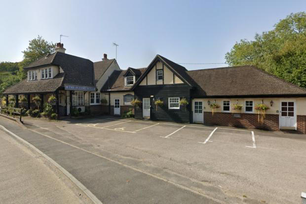 Pub that is only half in Sussex goes on sale