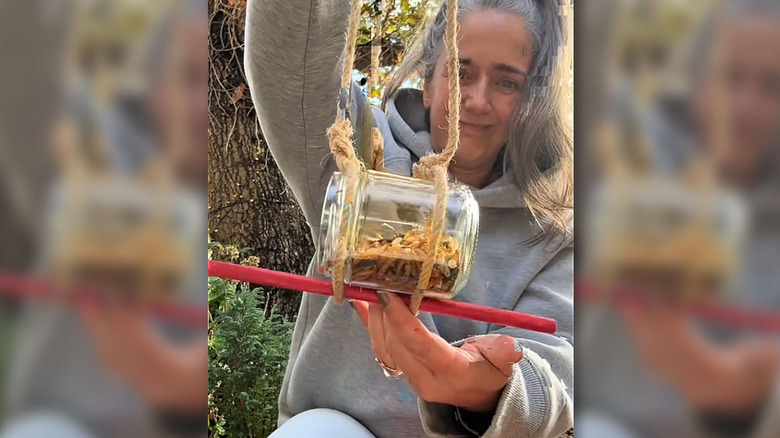 Repurpose an old glass jar into a simple bird feeder in minutes
