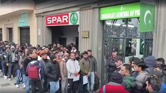 Migrants queue to apply for criminal records at Pakistan Embassy, Barcelona, Spain, 3 January 2026
