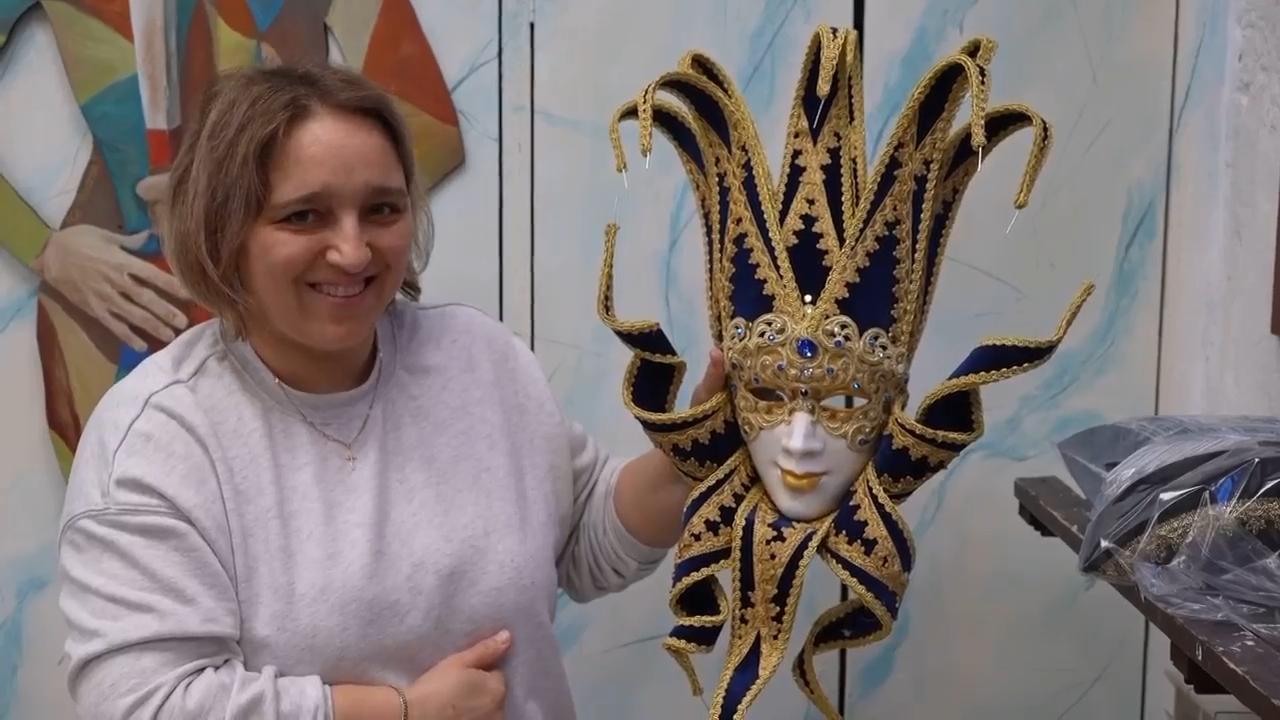 Artisans at a workshop in Venice handmake papier-mâché masks ...
