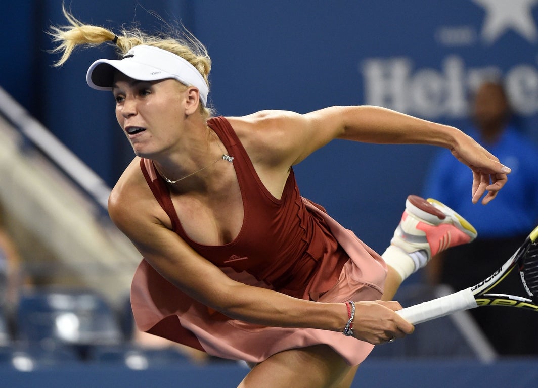 Caroline Wozniacki, women's tennis icon and SI Swim model, in photos