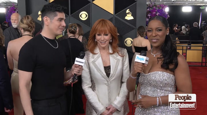 Reba McEntire says she has the 'best time' working with fiancé Rex Linn as  they walk the 2026 Grammys carpet (exclusive)