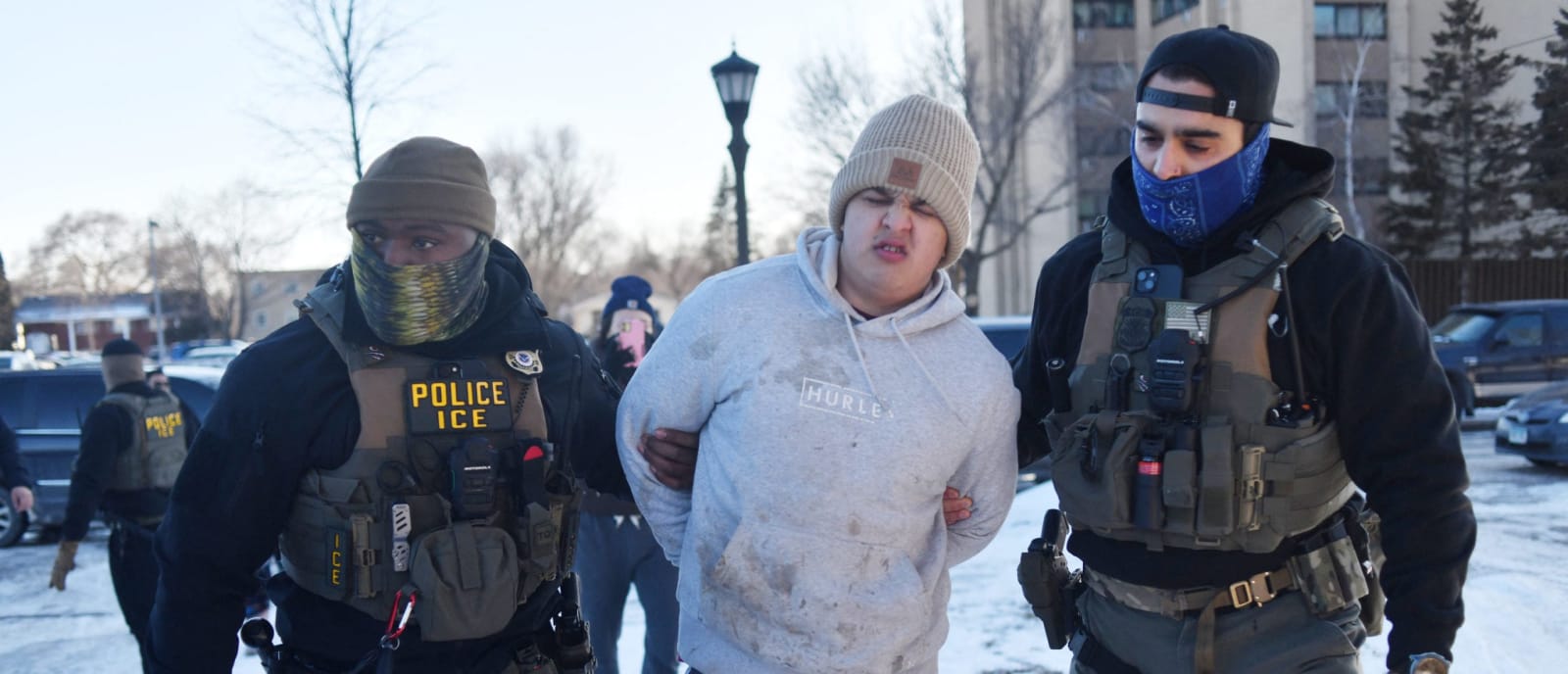 Federal immigration agents detain a man during an operation by US Immigration and Customs Enforcement (ICE) and Border Patrol in St. Paul, Minnesota, on January 27, 2026. ©Photo by Octavio Jones/AFP via Getty Images
