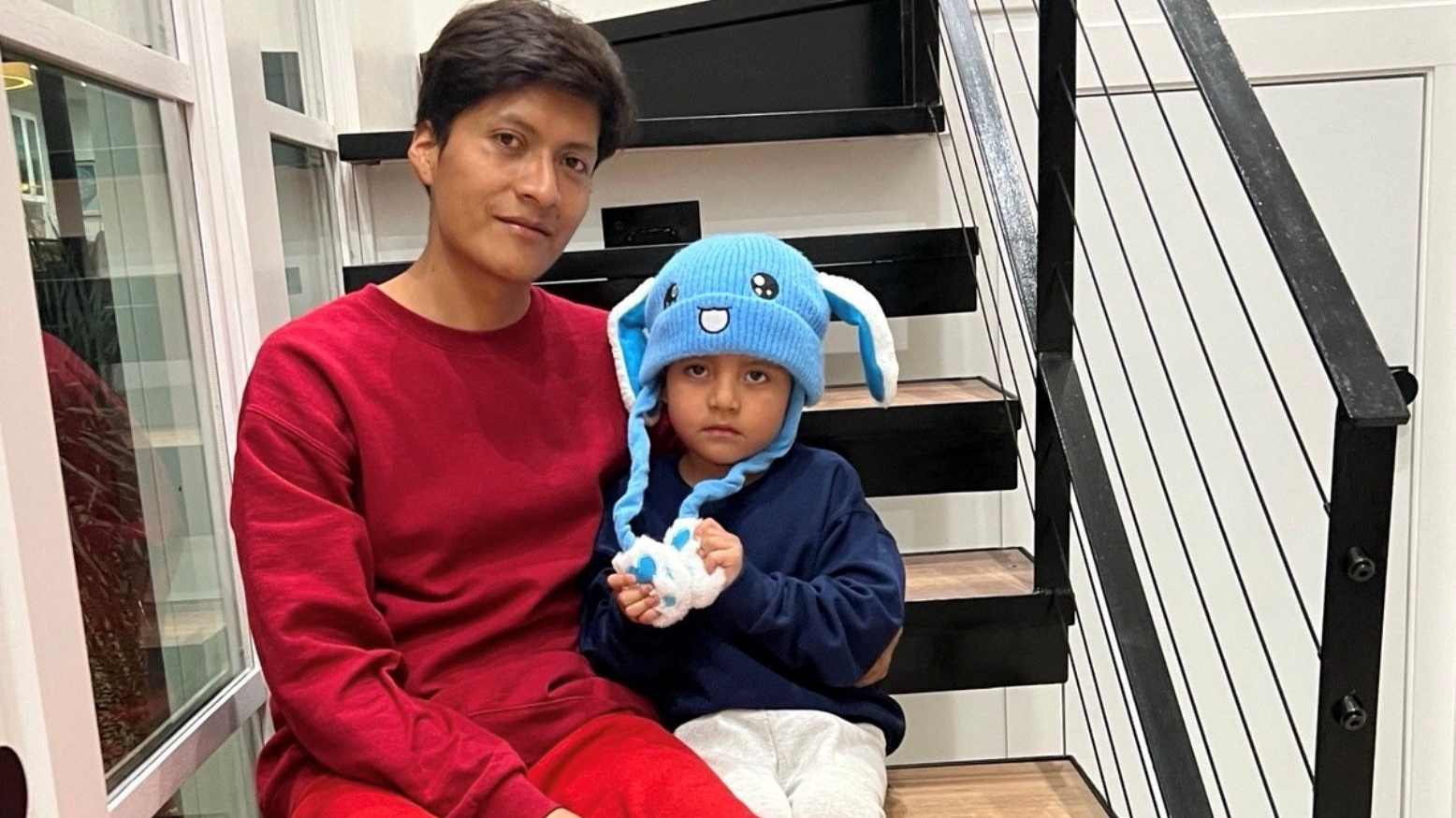 Boy, father released from federal custody return to Minnesota after judge