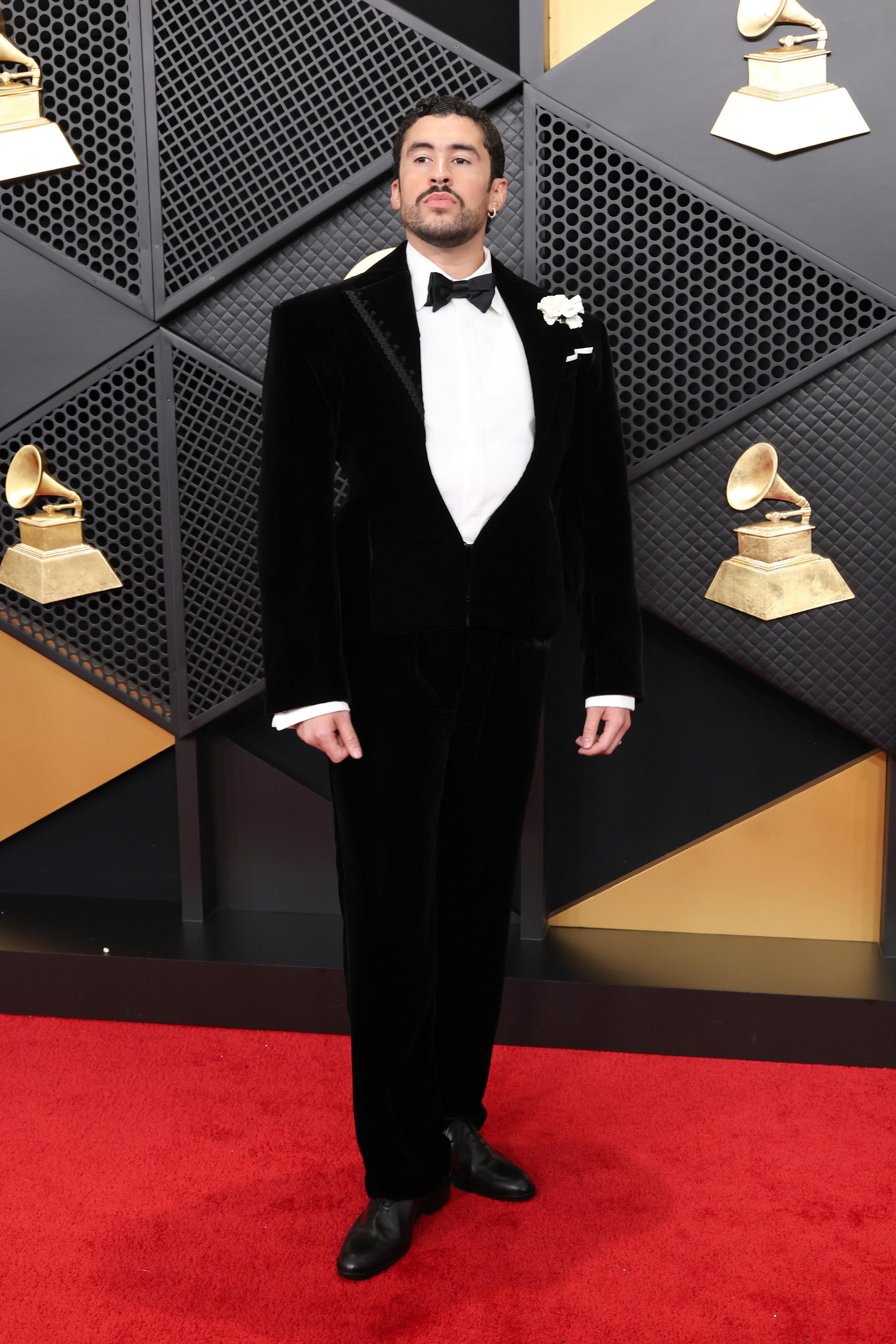 Bad Bunny keeps it dapper in a tux at the Grammys. See the look
