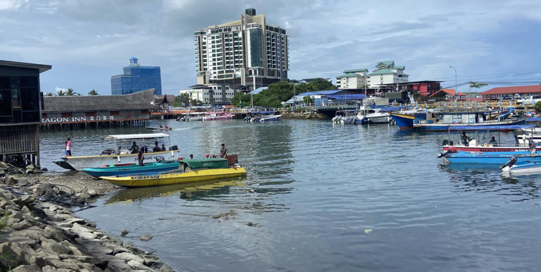 Fishermen and passenger boats are docked at the jetty in Semporna town, Sabah. Photo: Ushar Daniele