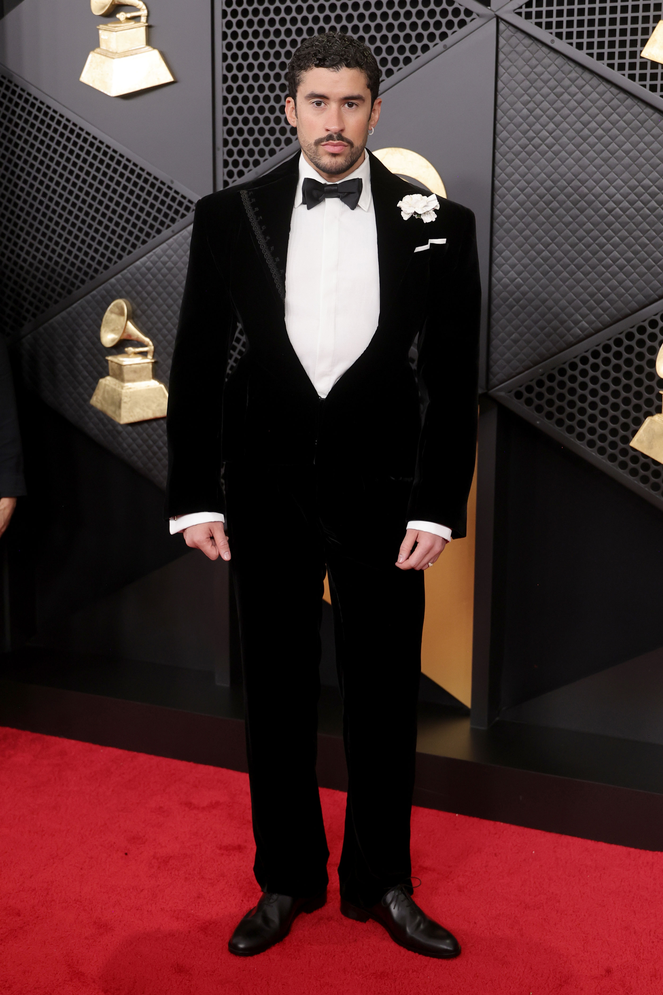Bad Bunny puts a twist on the classic tux on Grammys 2026 red carpet