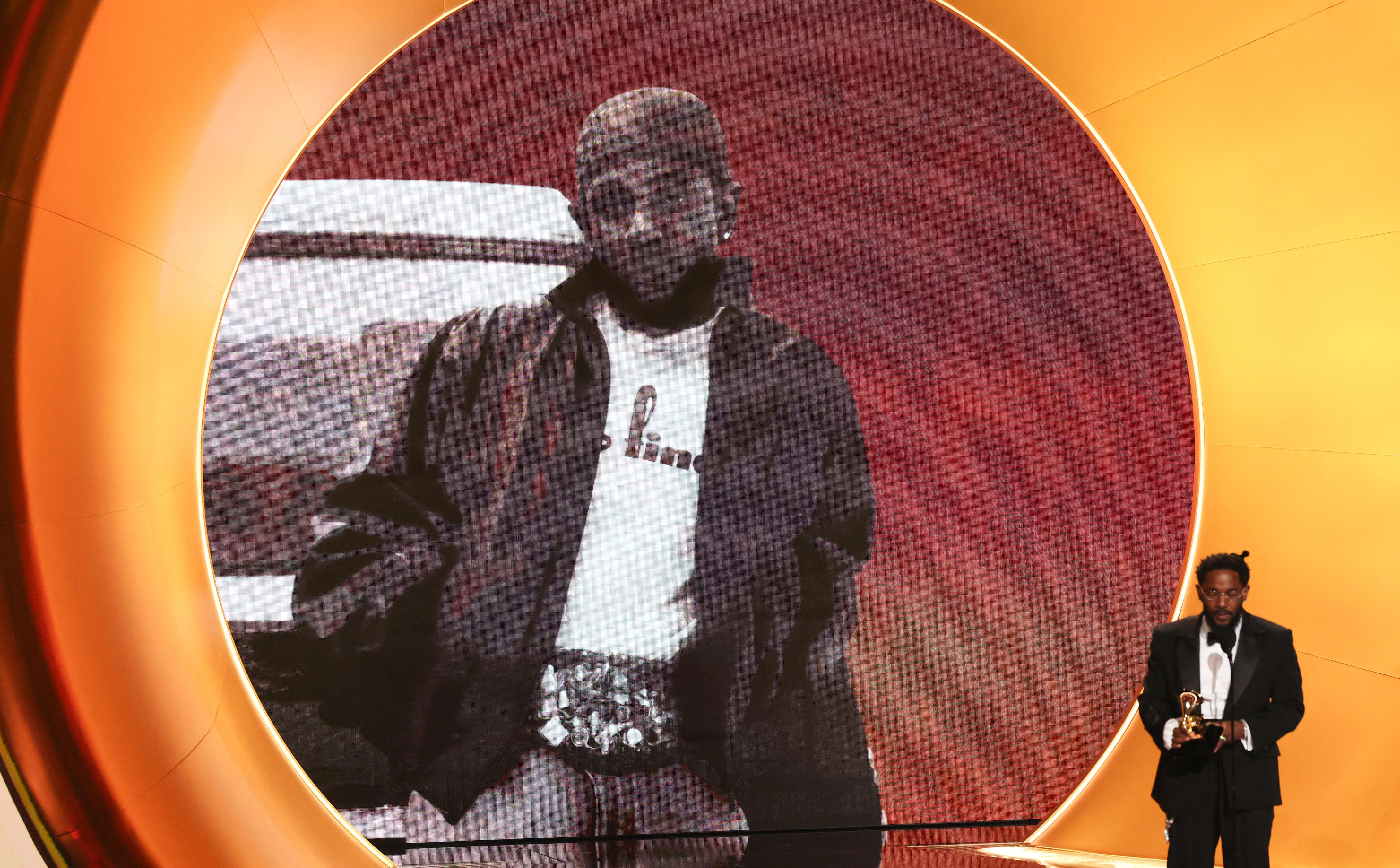 Rapper Kendrick Lamar accepts the award for best rap album.