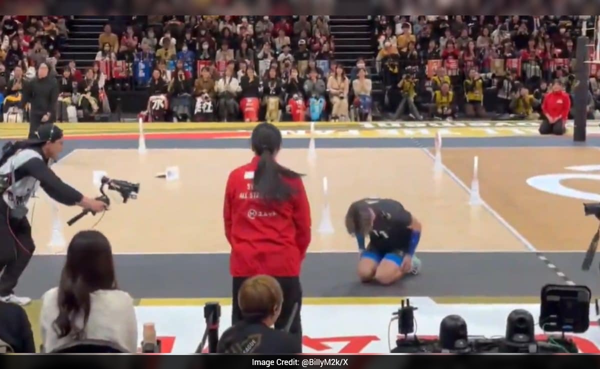 Japanese volleyball player's accidental serve hits judge, his sliding ...