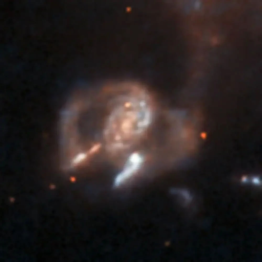 AA1VuJvg AI Unearths 1,300 New Cosmic Oddities from Hubble's Archive