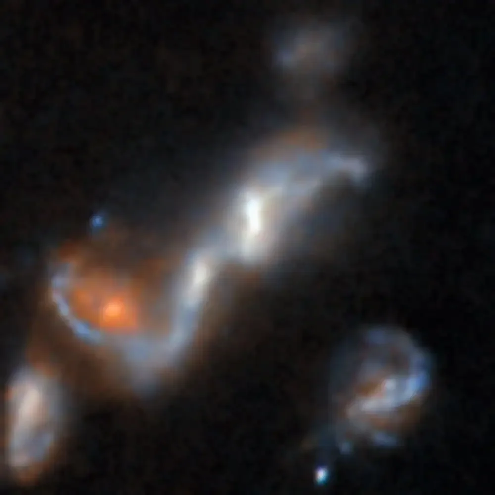AA1VuQKu AI Unearths 1,300 New Cosmic Oddities from Hubble's Archive