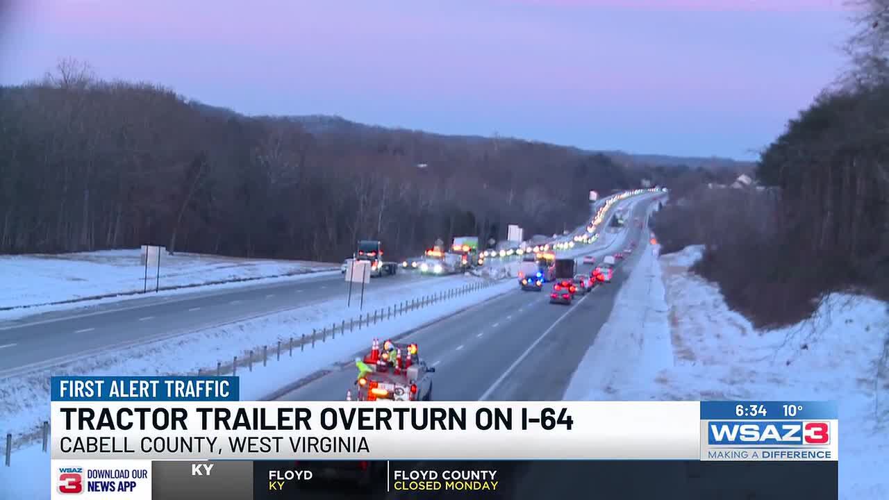 Tractor trailer rollover causing backups on I-64 and Route 60