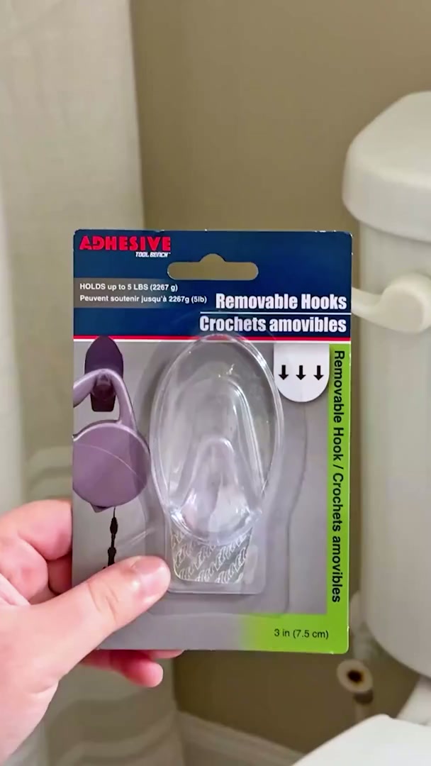 Stick a paper towel holder on your toilet (brilliant!)
