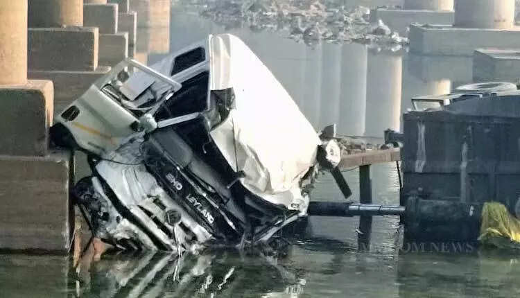 Driver killed after trailer truck plunges from bridge into river