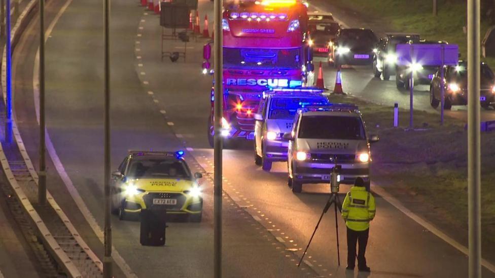 Man arrested after woman dies in A55 crash