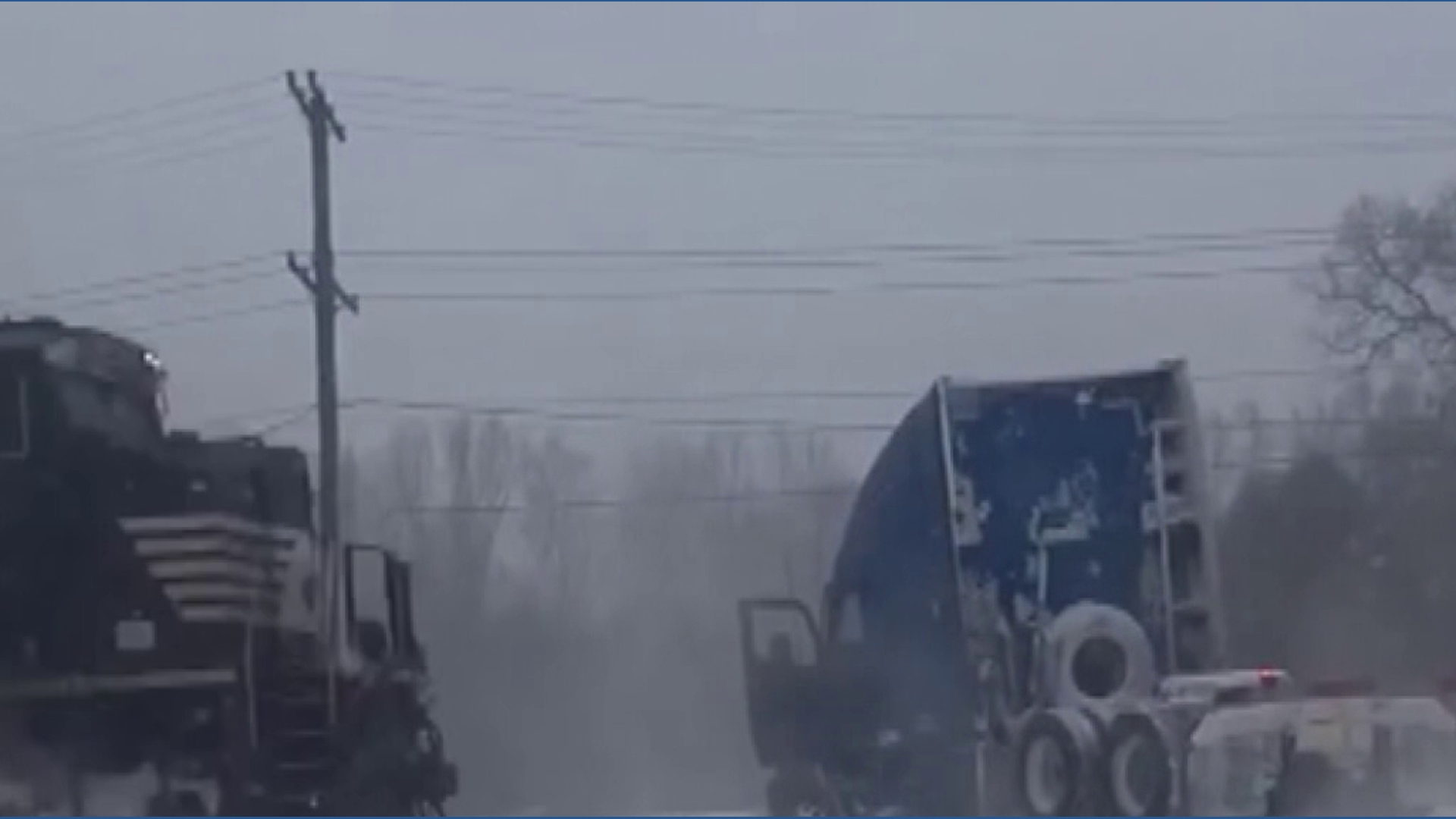 Video: Truck driver narrowly escapes train after getting stuck on snowy ...