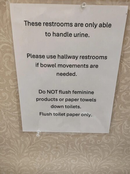 Absurd signs informing nobody of anything useful