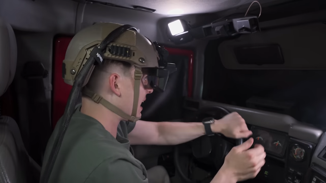 Watch a driver control a 5-ton Hummer without looking out the windows