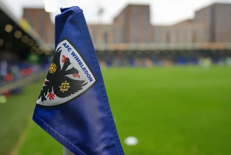 AFC Wimbledon officially sign former Liverpool striker
