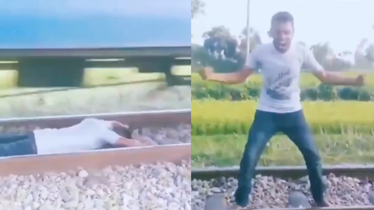 Man lays down on railway tracks as speeding train passes over him – all ...