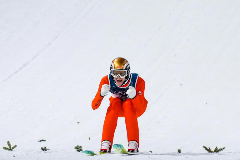 Philipp Raimund of Germany wins gold in thrilling normal hill ski jump ...