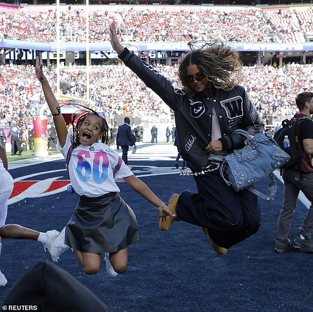 Jay-Z and Beyonce's daughter Rumi runs riot at Super Bowl before being ...