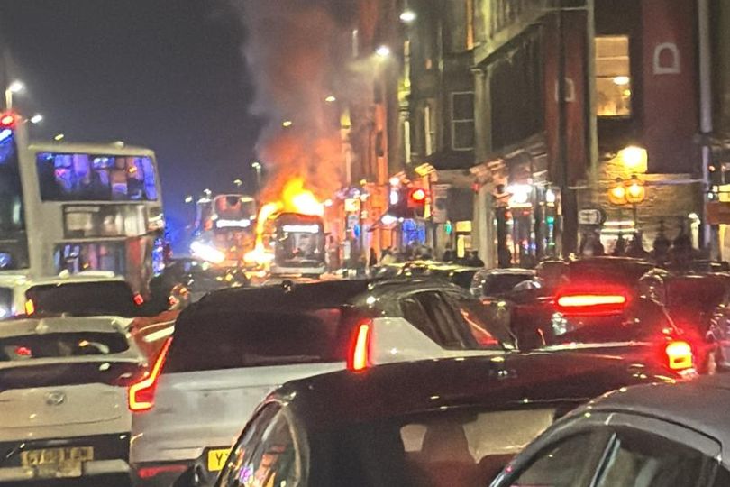 Bus bursts into flames on Edinburgh city centre street as road shut down