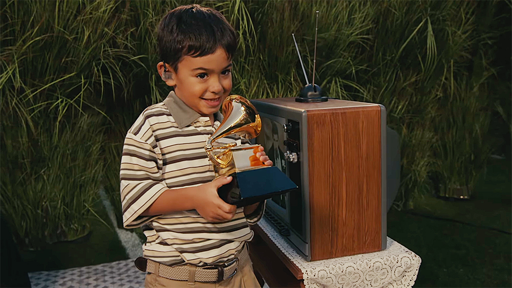 Who was the young boy Bad Bunny gave his Grammy to at the halftime show?