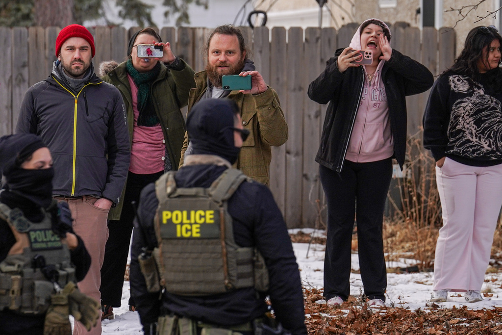 Masks emerge as symbol of Trump's ICE crackdown and a flashpoint in ...