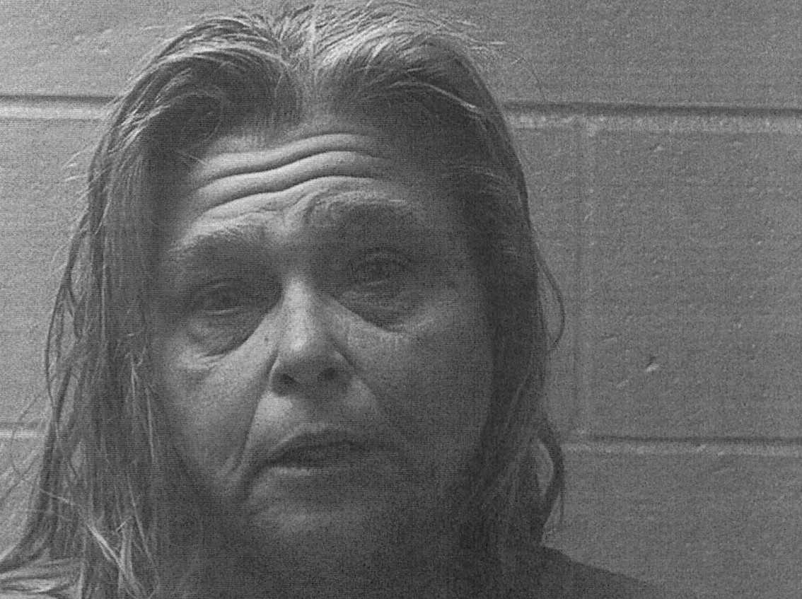 Woman charged with arson after she escaped house fire, police say